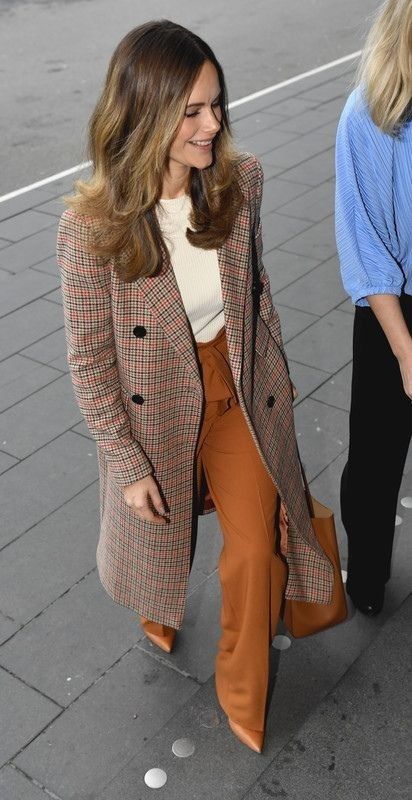 Plaid Coat and Brown Trousers